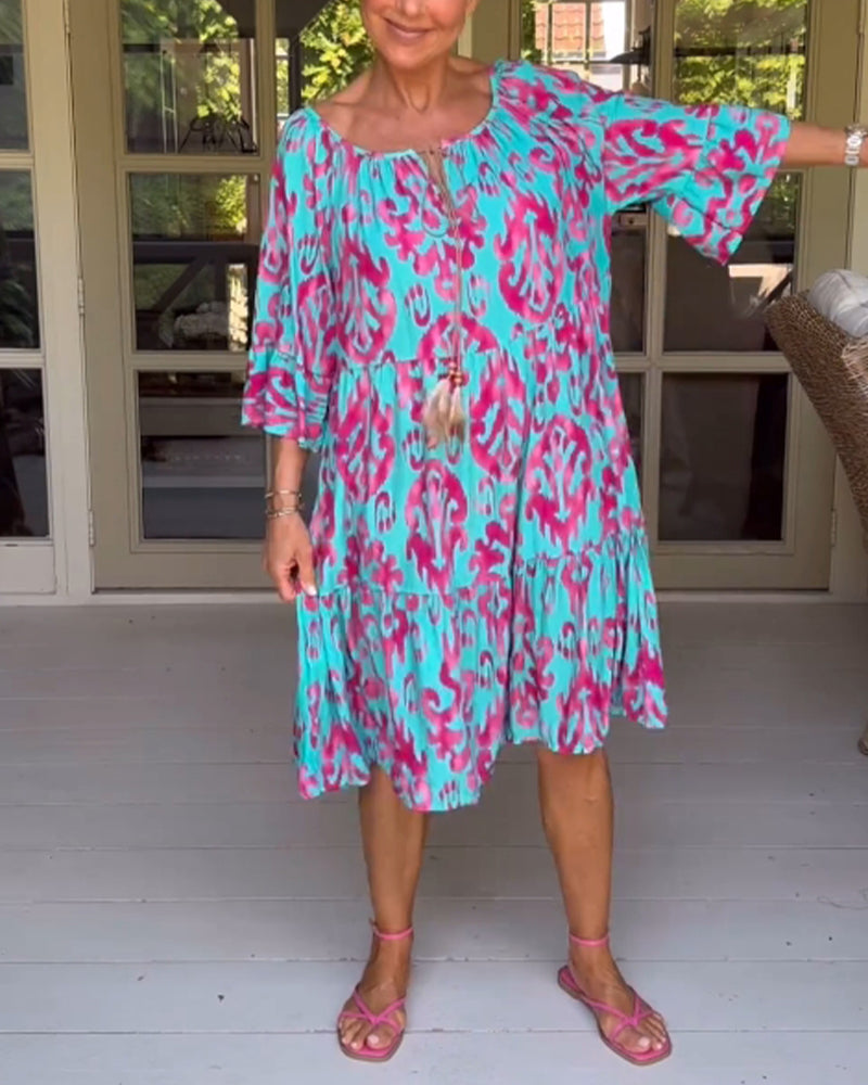 Red dress with print and three-quarter sleeves