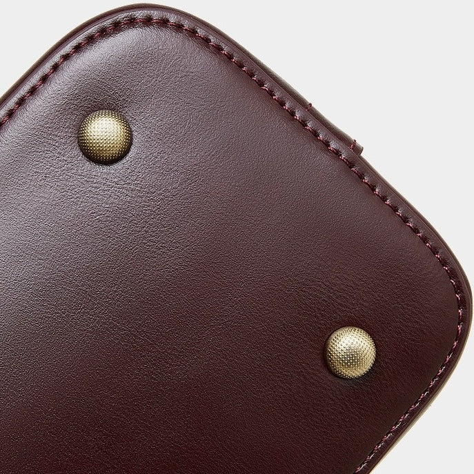 Women's Genuine Leather Dome Satchel with Signature Tassel