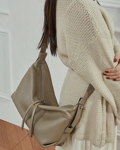 Women's Genuine Pebbled Leather Crescent Bag with Tassel Accent