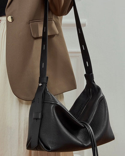 Women's Genuine Pebbled Leather Crescent Bag with Tassel Accent