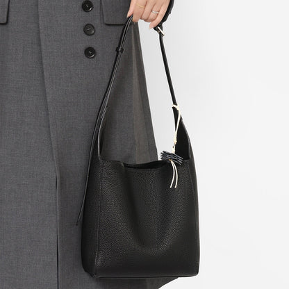 Textured Genuine Leather Hobo Bag with Floral Charm